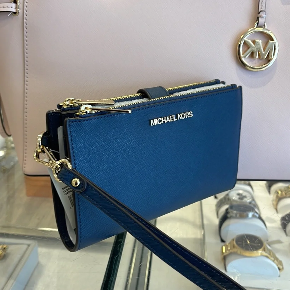 MICHAEL KORS LARGE DOUBLE ZIP WRISTLET WALLET PHONE CASE
Navy
NWT - Picture 11 of 16
